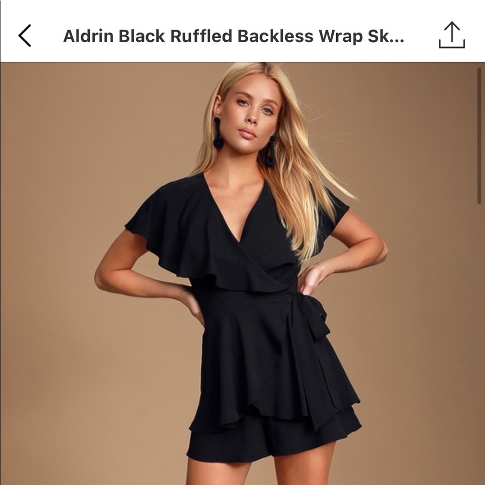 Lulu black romper. Size S. Never worn. Tags on.